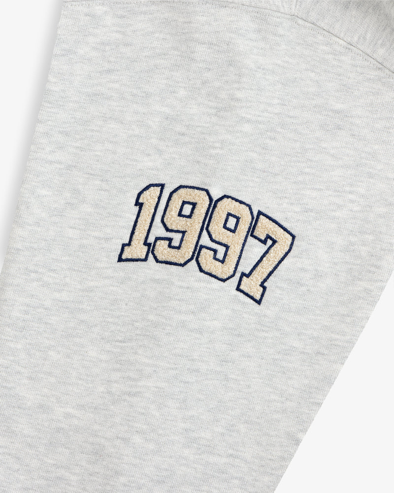Mulberry Letterman Hoodie in gray with “1997” beige embroidery outlined in black on the fabric.
