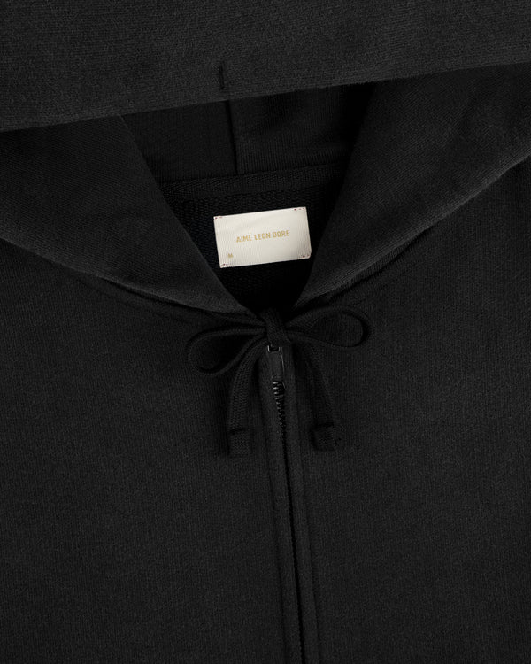 Black Washed Full Zip Hoodie with a drawstring hood and a brand label at the inner neckline.