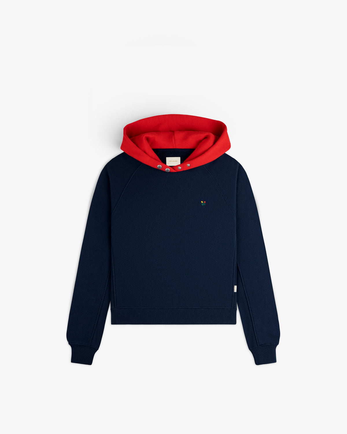 Colorblock Crest Snap Hoodie: a navy blue long-sleeved pullover with a red hood and snap buttons at the neck.