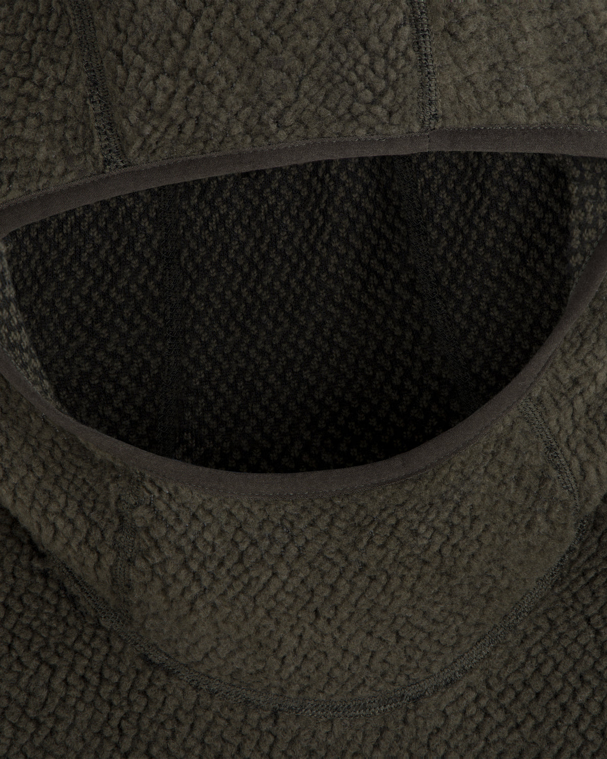 Close-up of the olive green textured hood on a Fleece Performance Hoodie.