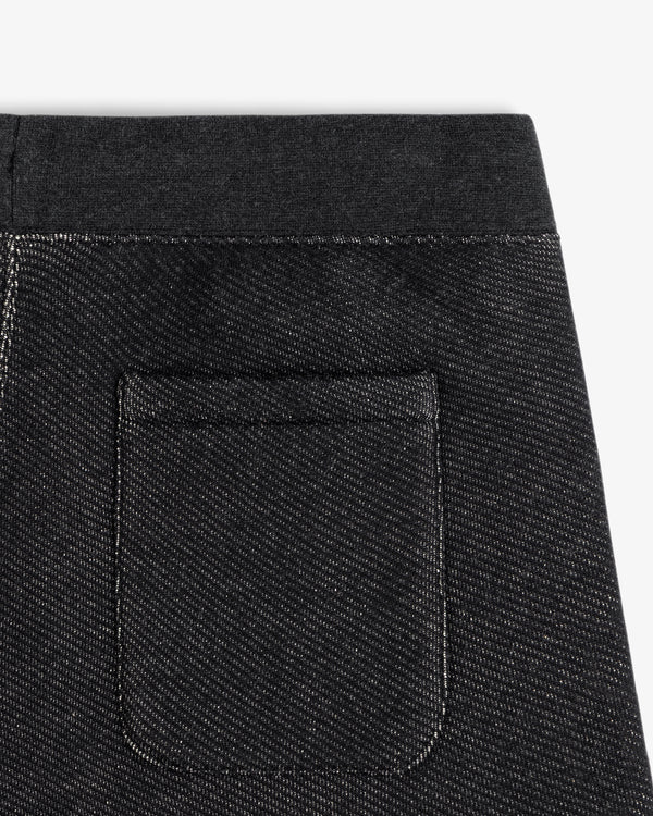 Close-up of the charcoal gray Terry Lounge Sweatpant back pocket with an elastic waistband.
