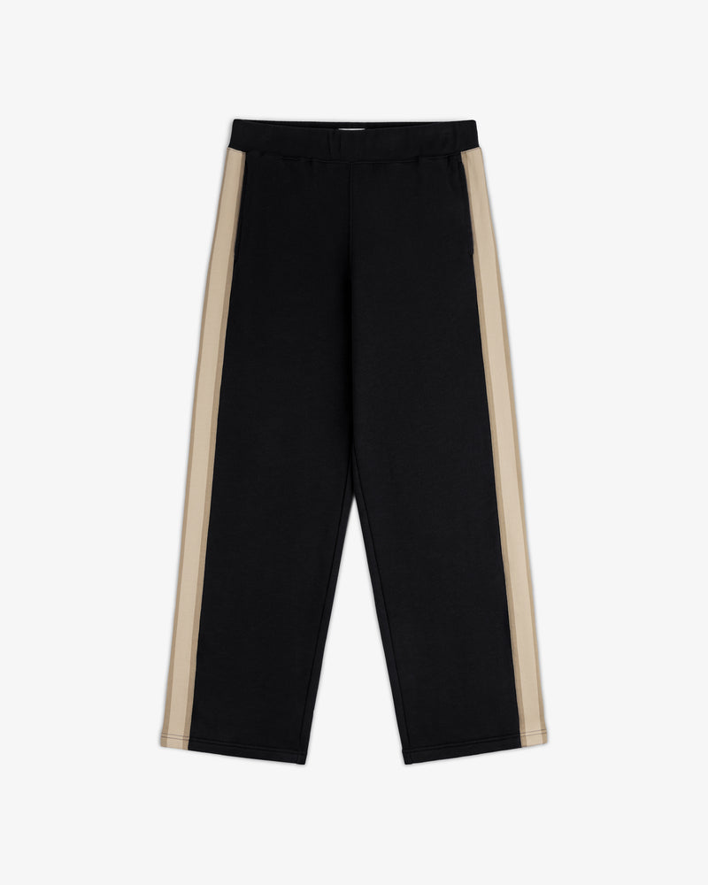 Saint George Track Pant: black with wide beige side stripes, elastic waist, straight legs, shown flat on white background.
