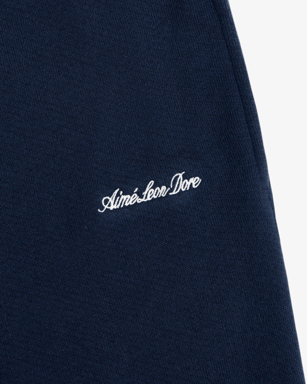 Navy blue Script Sweatpant featuring white embroidered cursive text.
