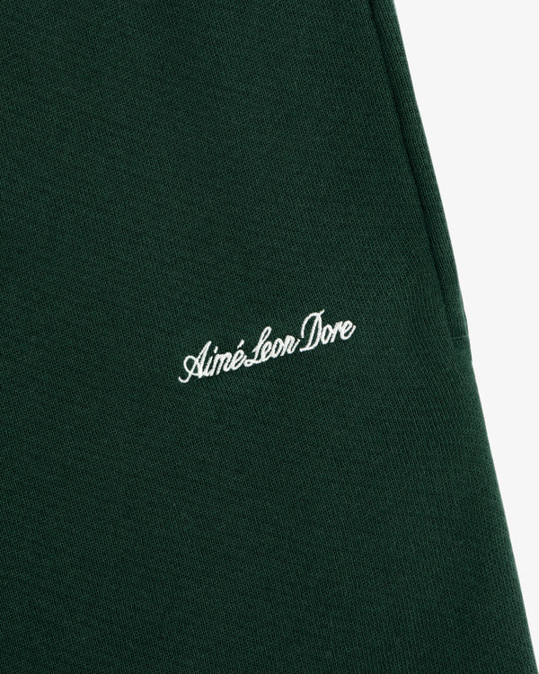 Dark green Script Sweatpant featuring white cursive script embroidery.