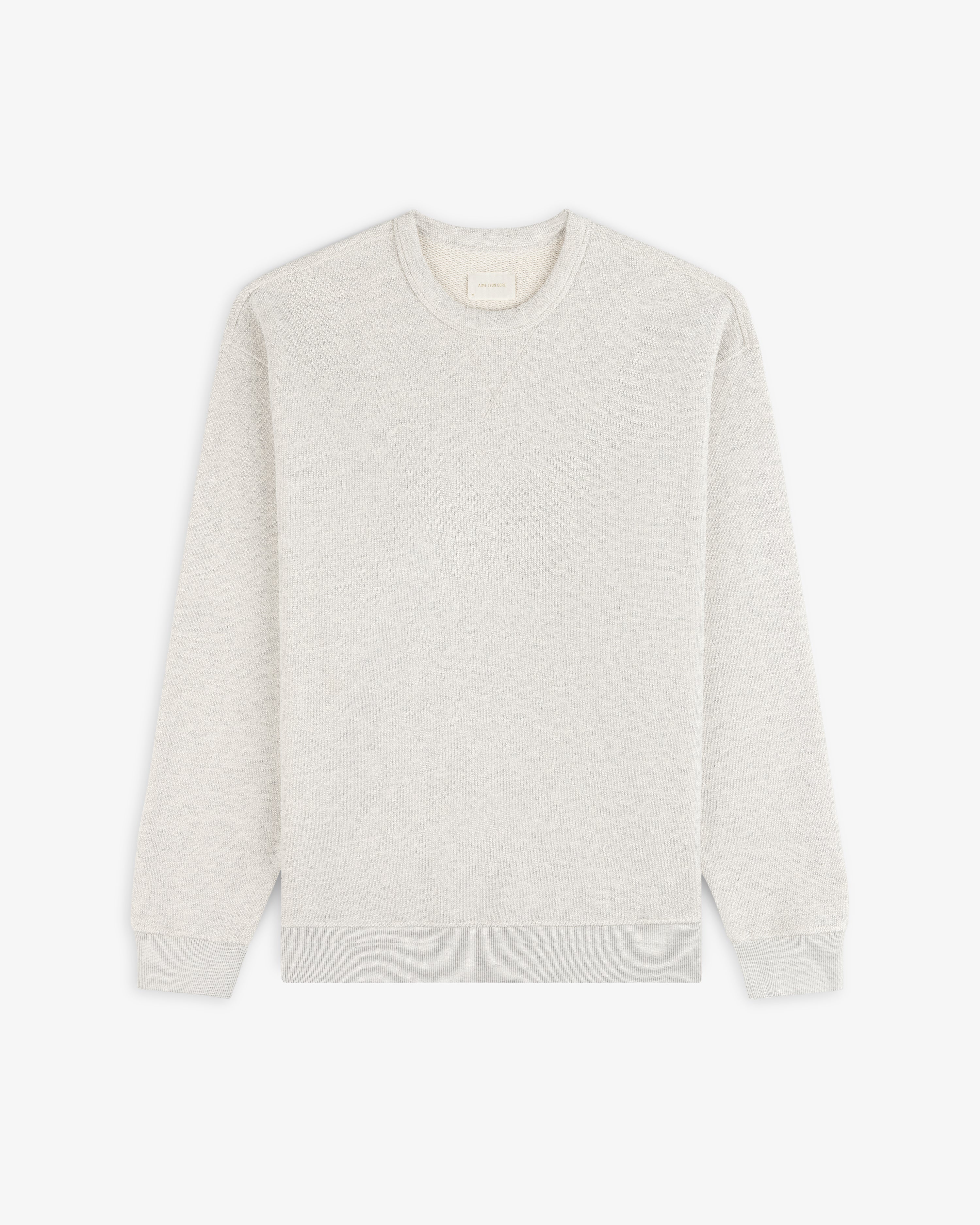 Stone Washed Marina Crewneck Sweatshirt in light gray with long sleeves, shown flat on a white background.