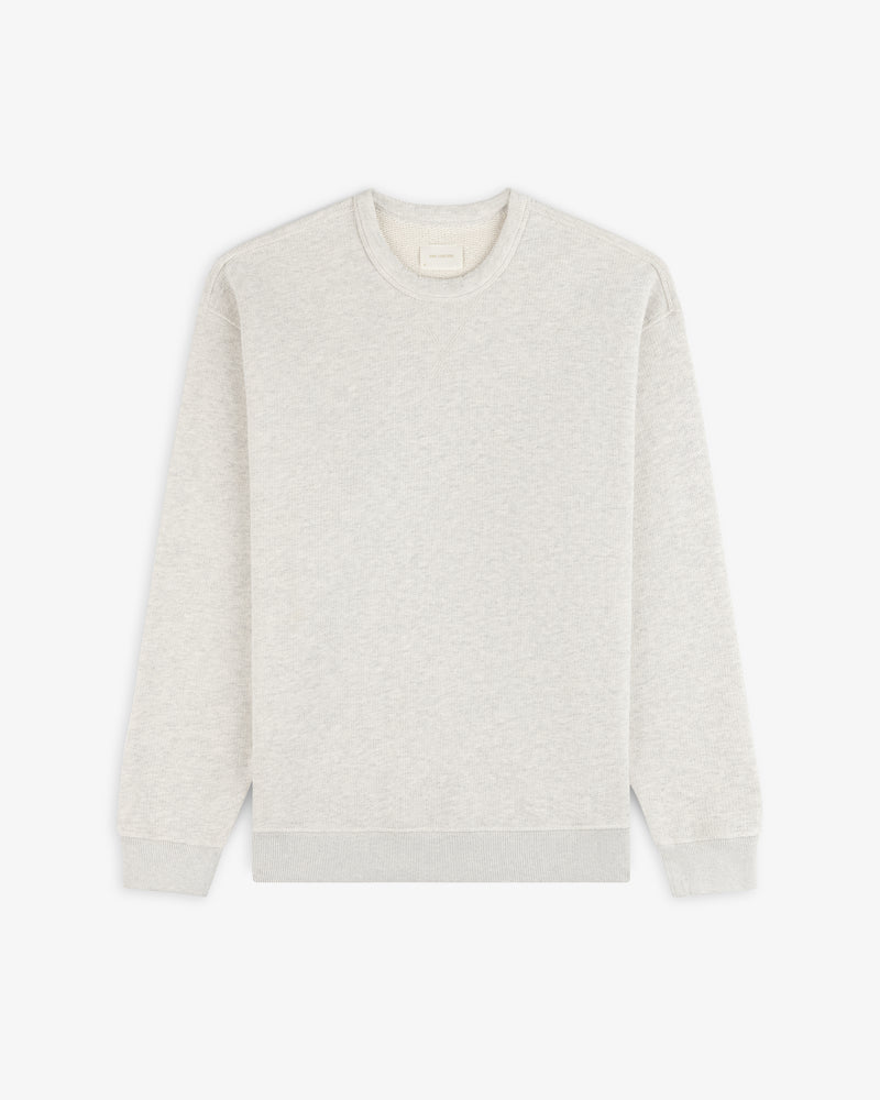 Stone Washed Marina Crewneck Sweatshirt in light gray with long sleeves, shown flat on a white background.