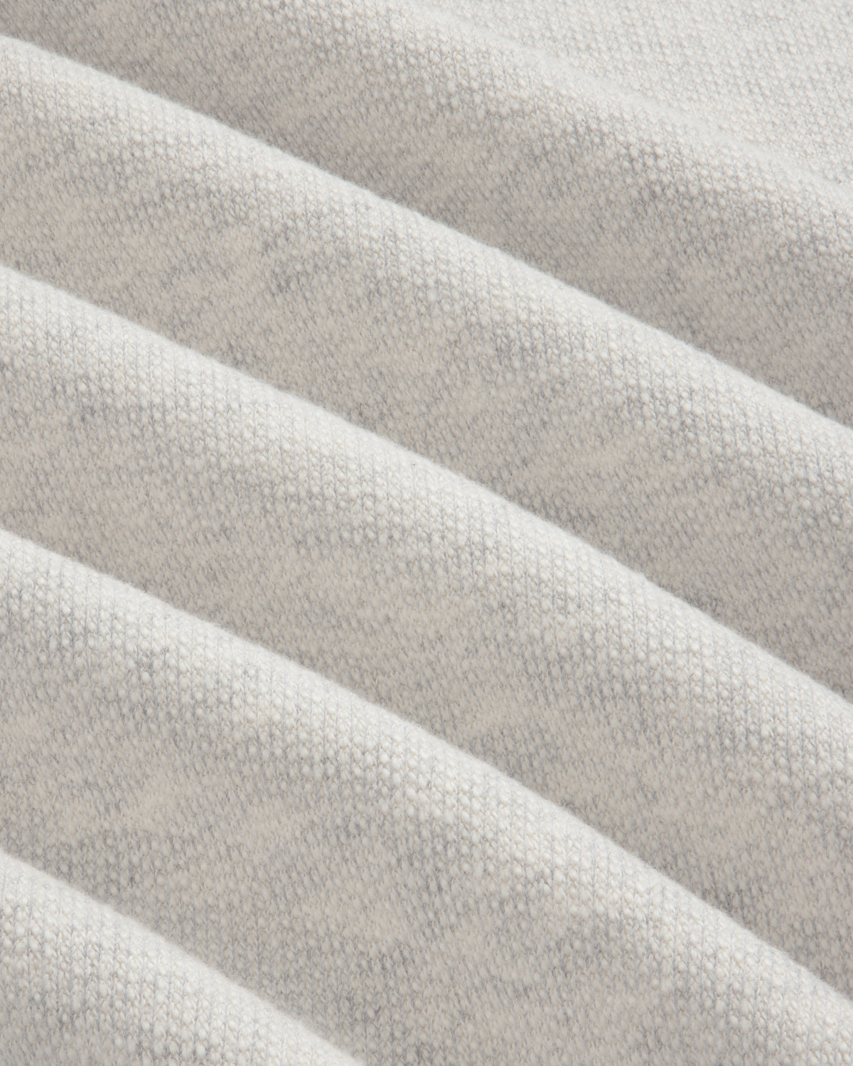 Close-up of the Stone Washed Marina Crewneck Sweatshirt in light gray with soft, diagonal ridged texture.