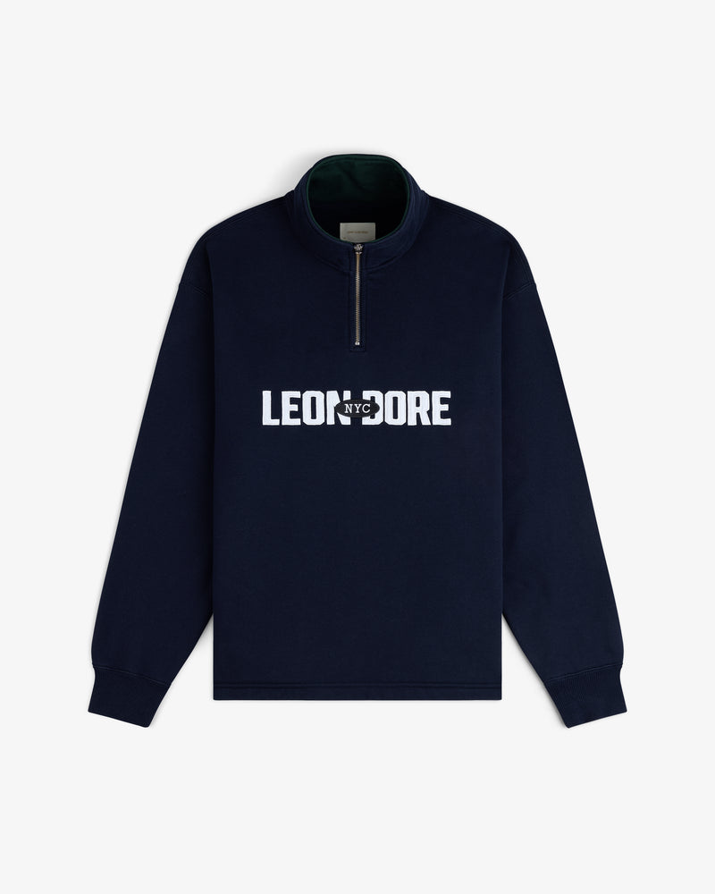 Aimé Souvenir Quarter Zip: Navy blue with “LEON NYC DORE” in white across the chest.