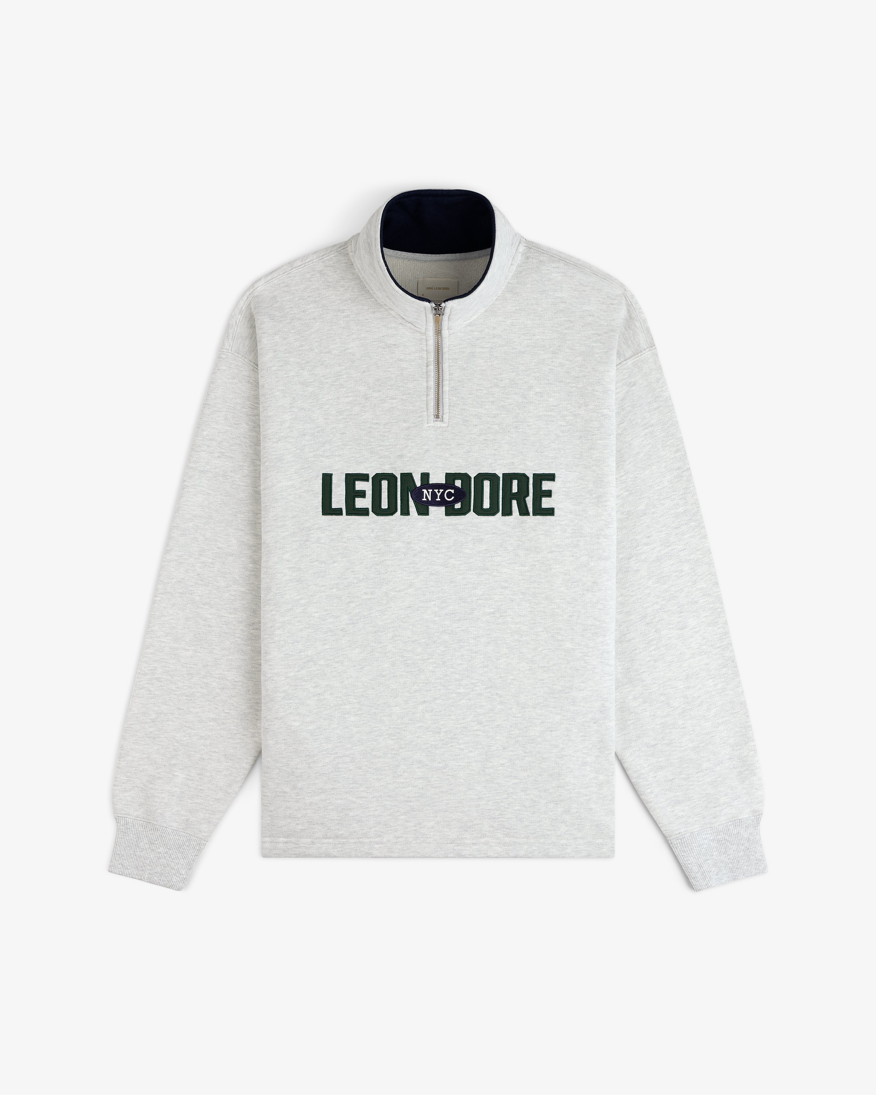 Light gray Aimé Souvenir Quarter Zip with LEON DORE NYC in black and green letters across the chest.