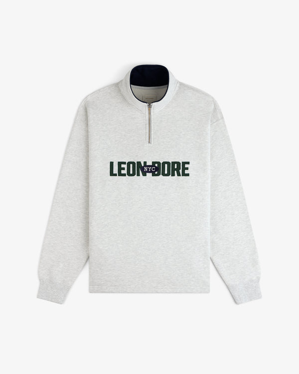 Light gray Aimé Souvenir Quarter Zip with LEON DORE NYC in black and green letters across the chest.