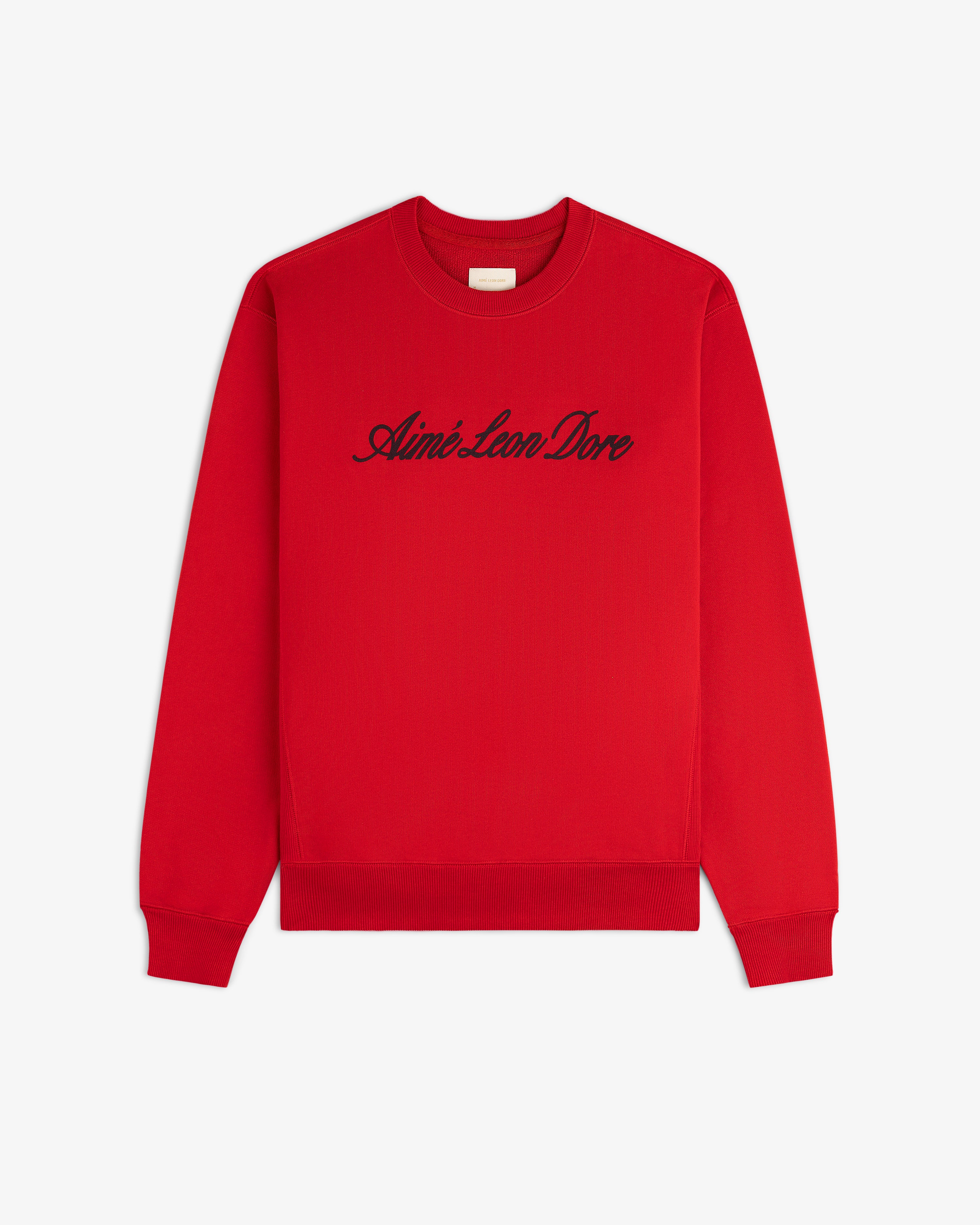 Vintage Script Crewneck Sweatshirt in red with black Aimé Leon Dore script, displayed flat on a white background.
