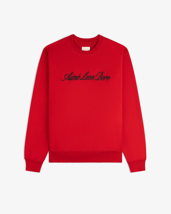 Vintage Script Crewneck Sweatshirt in red with black Aimé Leon Dore script, displayed flat on a white background.