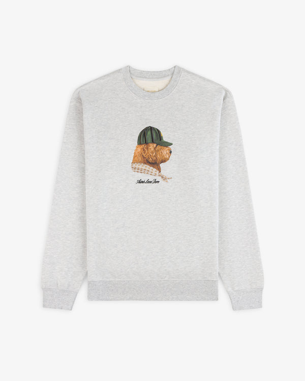Buddy Crewneck Sweatshirt in light grey features an embroidered dog with a green cap on the front, shown on white.