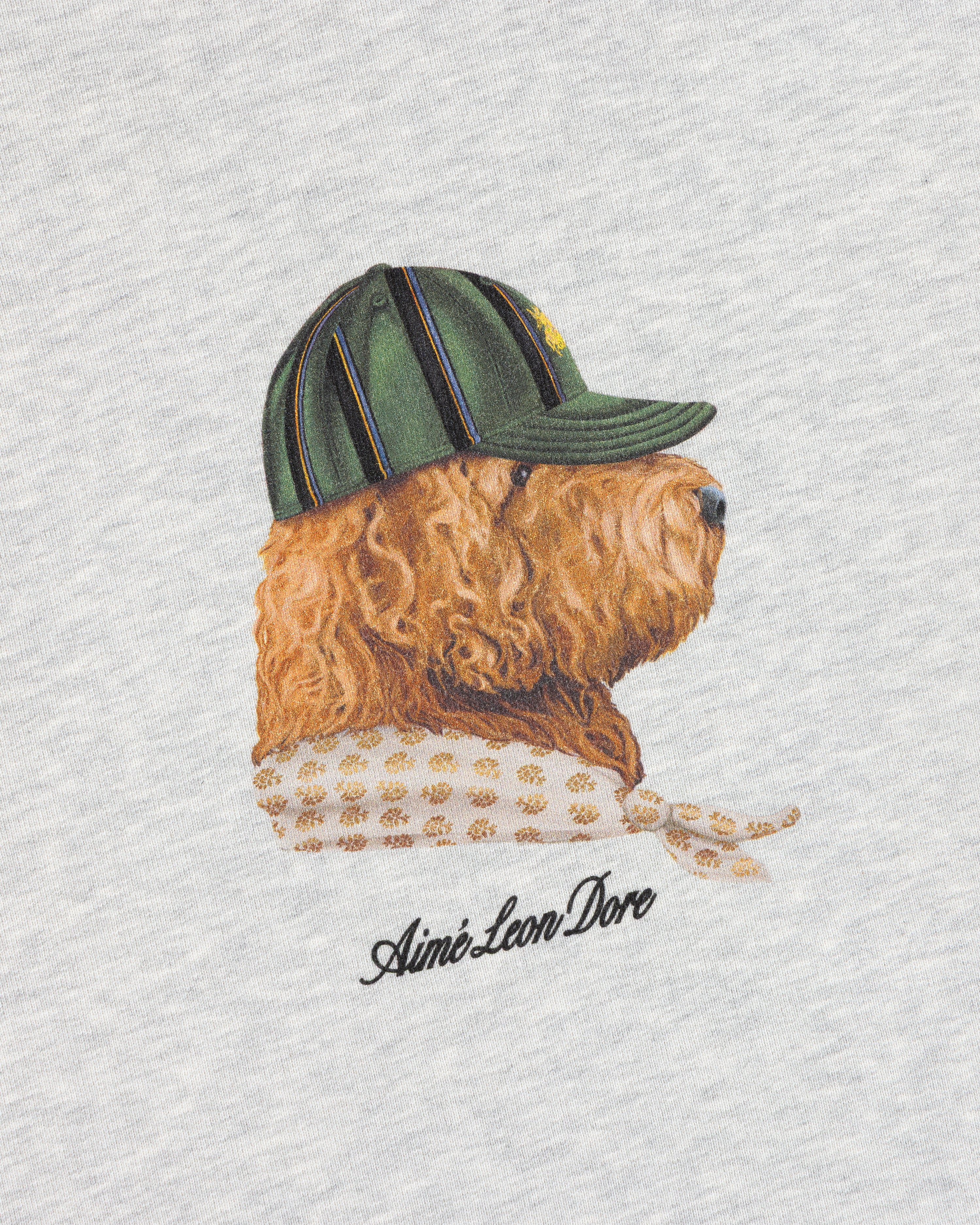 Buddy Crewneck Sweatshirt features an embroidered dog in a cap and scarf with Aimé Leon Dore on light gray fabric.
