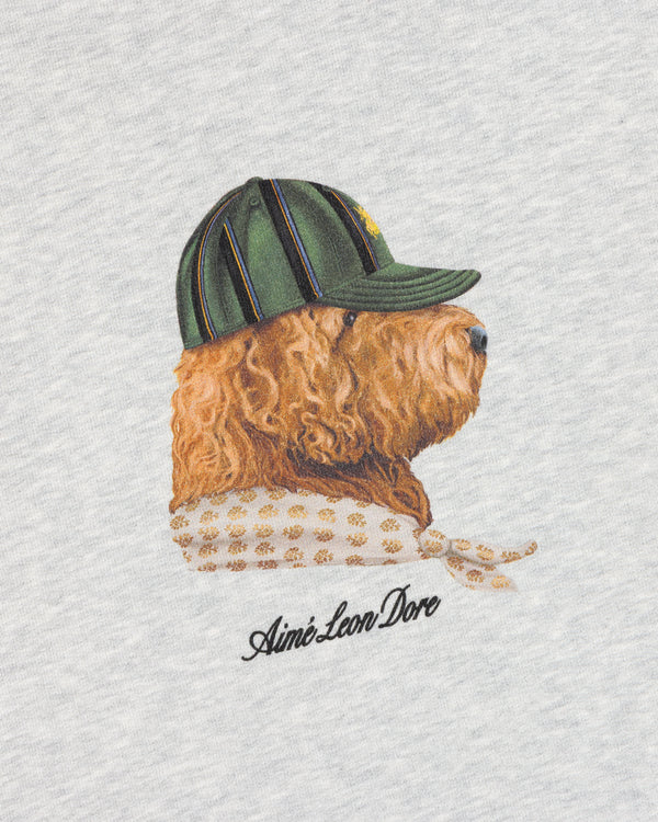 Buddy Crewneck Sweatshirt features an embroidered dog in a cap and scarf with Aimé Leon Dore on light gray fabric.