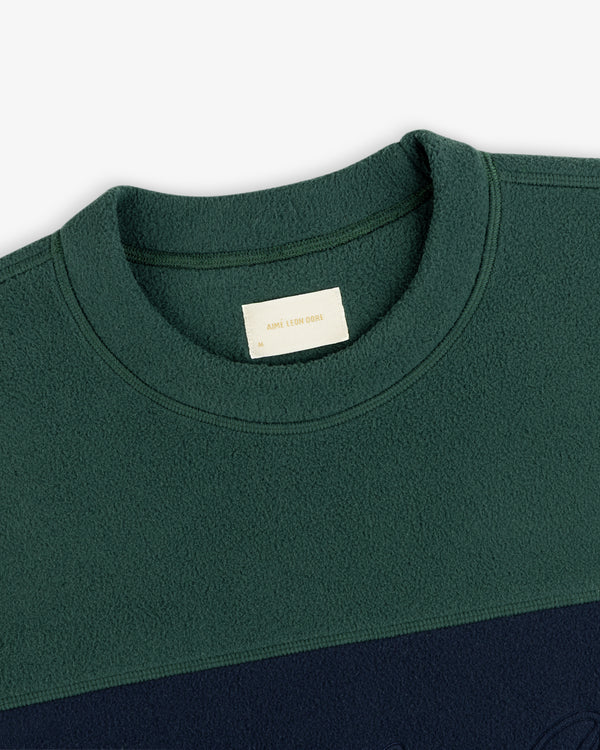 Dark green Fleece Script Paneled Crewneck Sweatshirt with a label at the collar.