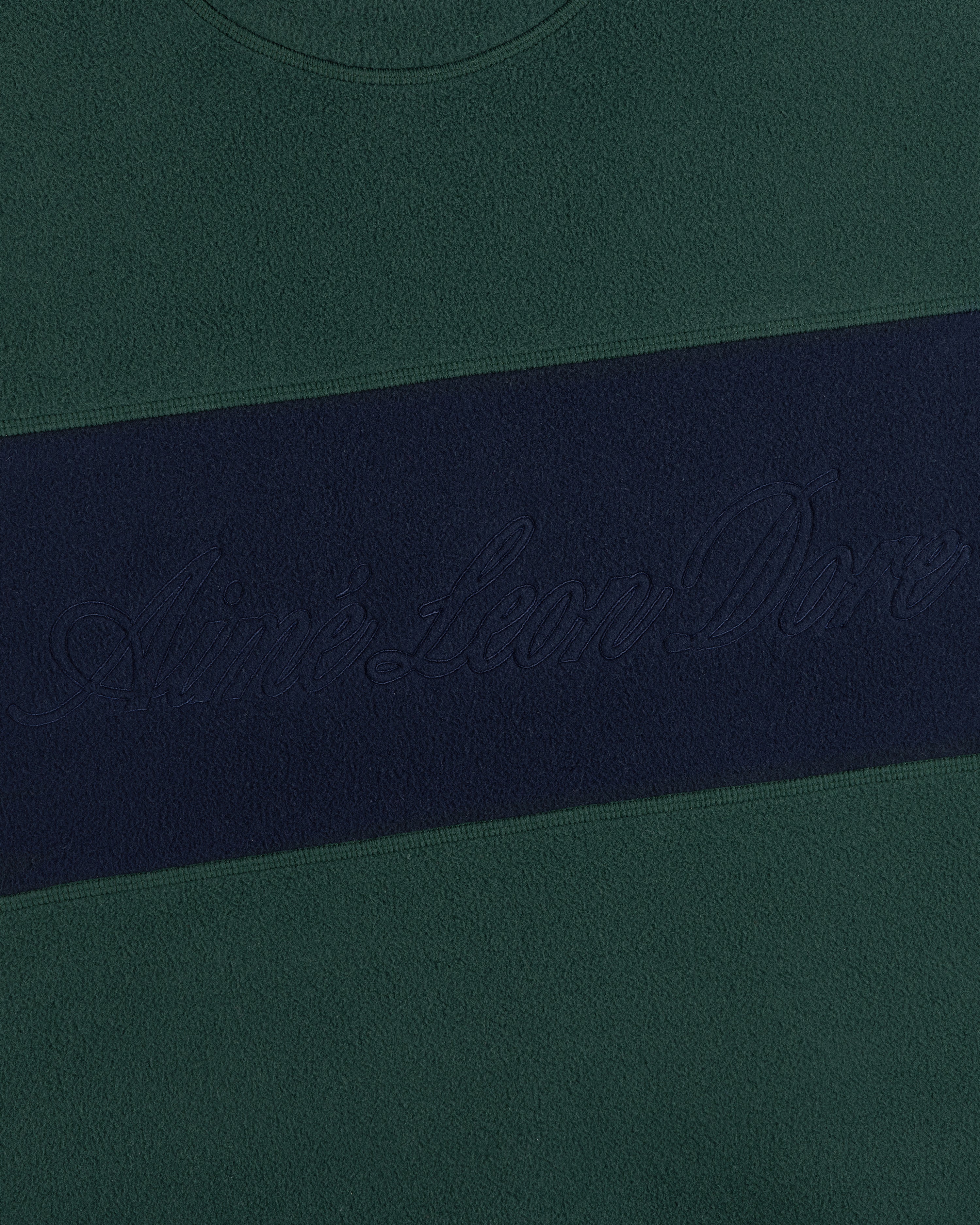 Fleece Script Paneled Crewneck Sweatshirt in dark green with a navy blue chest stripe and embroidered script text.