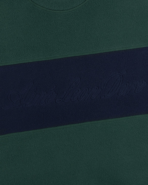 Fleece Script Paneled Crewneck Sweatshirt in dark green with a navy blue chest stripe and embroidered script text.