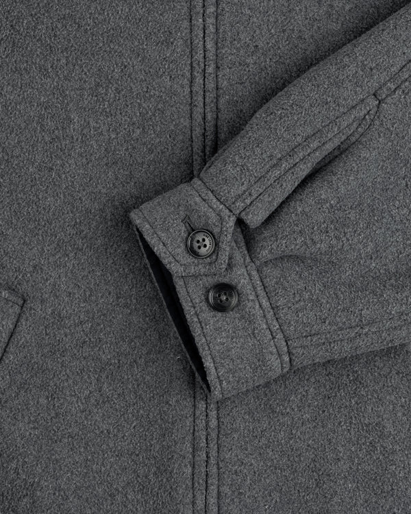 Close-up of Crest Fleece Casual Jacket sleeve in gray, featuring two black buttons and a partial view of pocket.