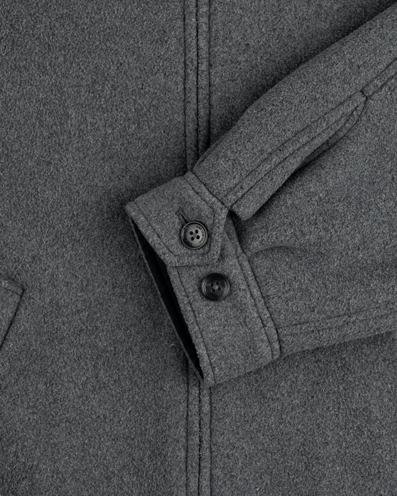 Close-up of Crest Fleece Casual Jacket sleeve in gray, featuring two black buttons and a partial view of pocket.