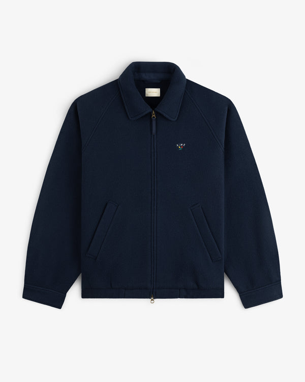 Crest Fleece Casual Jacket—navy zip-up with collar, front pockets, and small logo on the left chest.