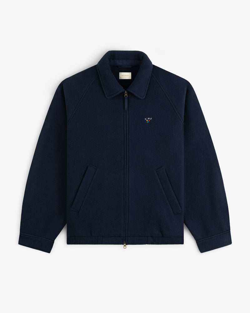 Crest Fleece Casual Jacket—navy zip-up with collar, front pockets, and small logo on the left chest.