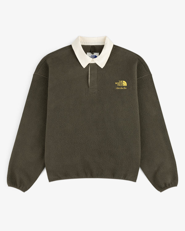 ALD / The North Face Fleece Rugby in dark green with white collar, yellow chest logo, and long sleeves.