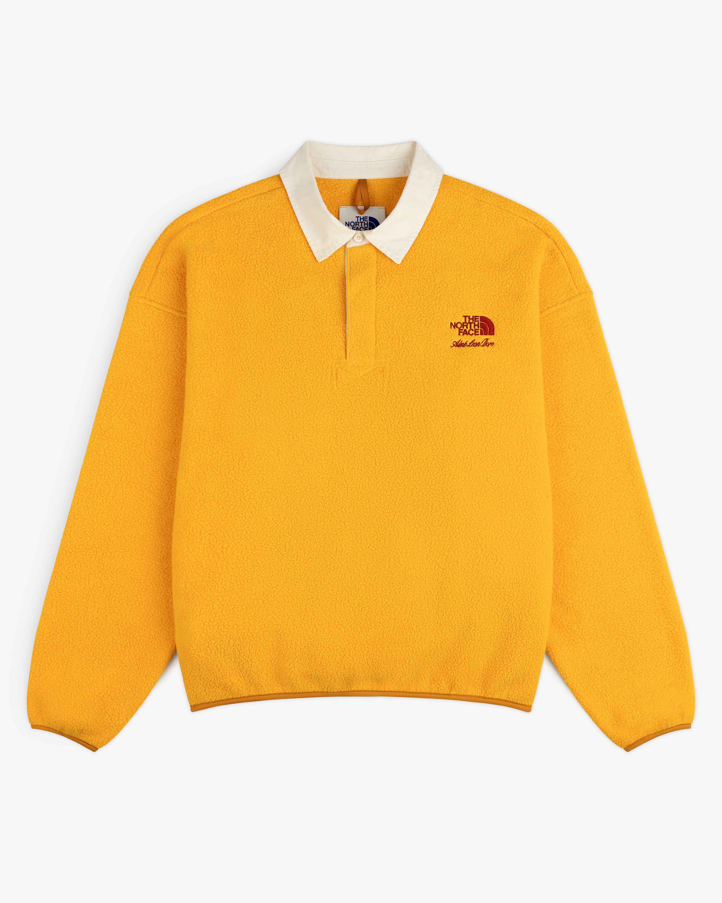 Bright yellow ALD / The North Face Fleece Rugby with white collar and embroidered logo on the left chest.