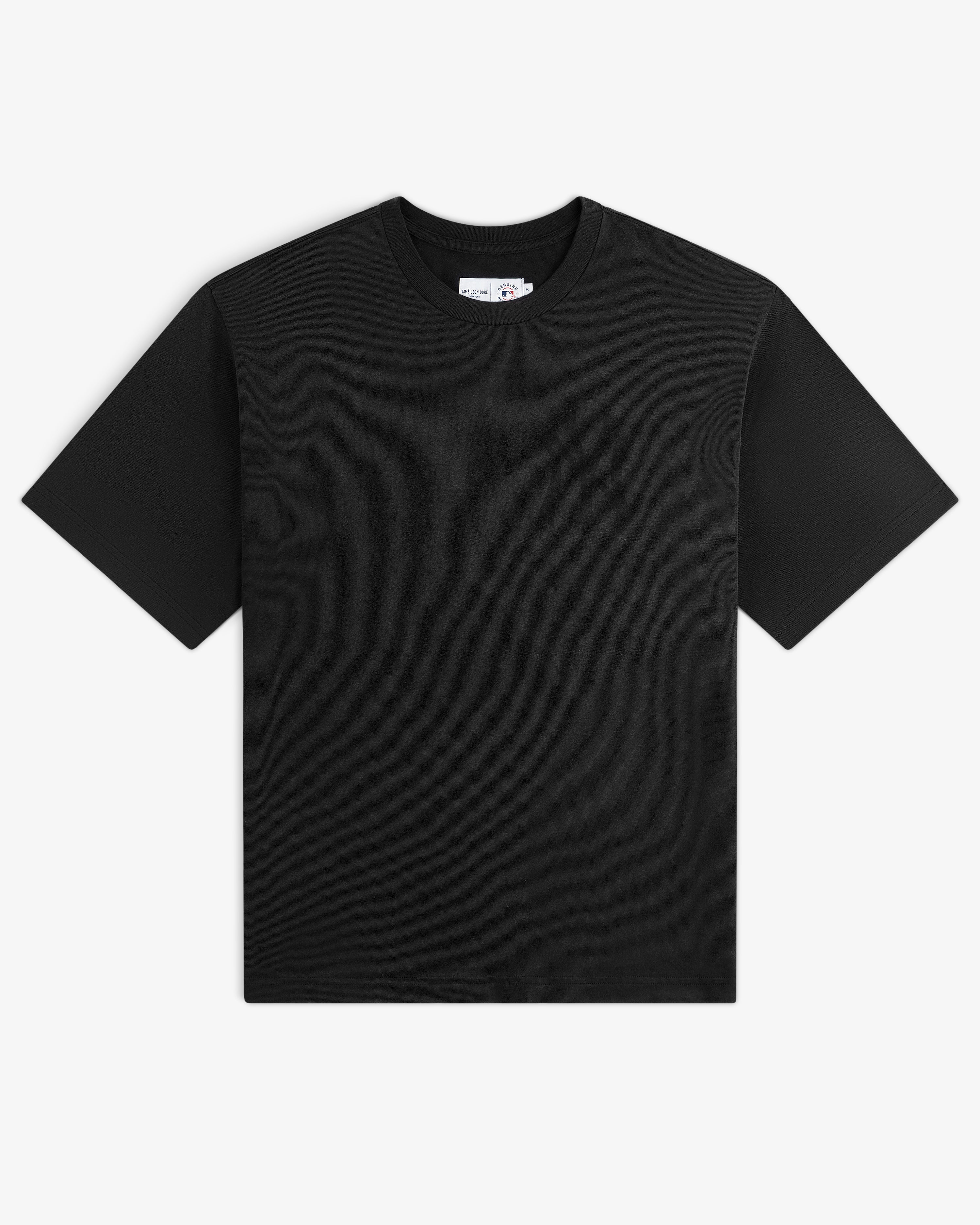 Yankees Washed Logo Tee: Black short-sleeve shirt with a subtle Yankees logo on left chest, shown on white background.