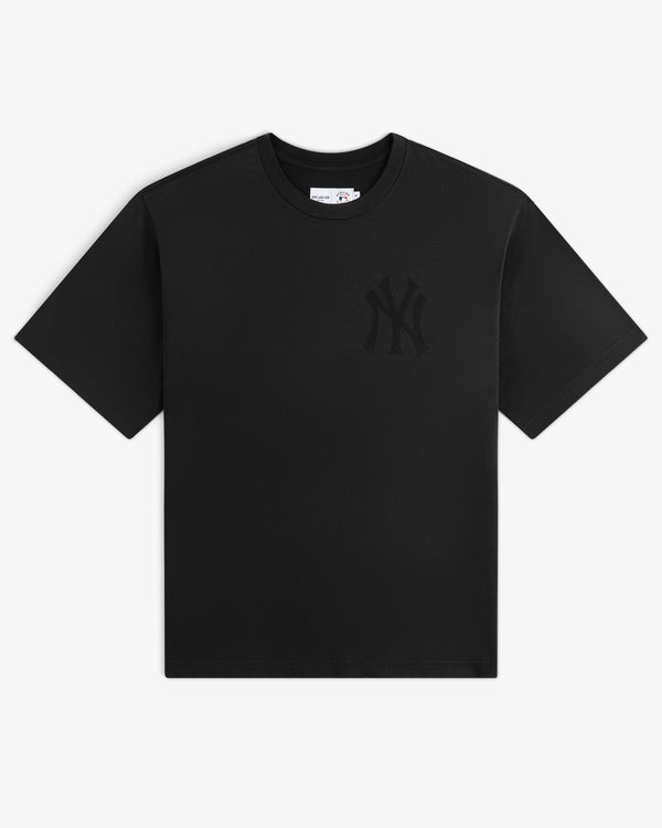Yankees Washed Logo Tee: Black short-sleeve shirt with a subtle Yankees logo on left chest, shown on white background.