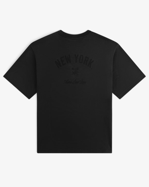Yankees Washed Logo Tee with NEW YORK and a small emblem in dark print on the back.