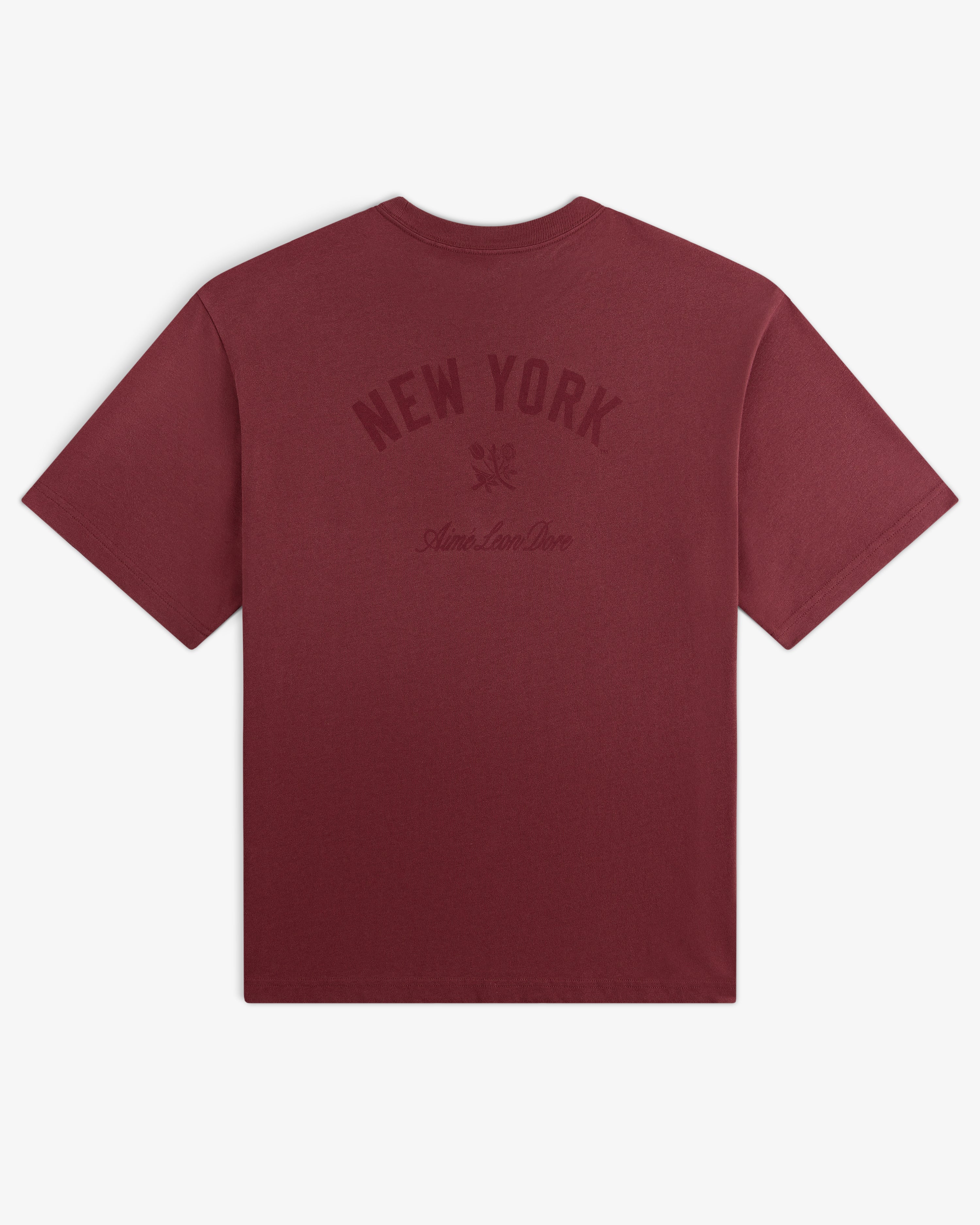 Yankees Washed Logo Tee: Maroon t-shirt with NEW YORK and Aimé Leon Dore text in dark print on back.