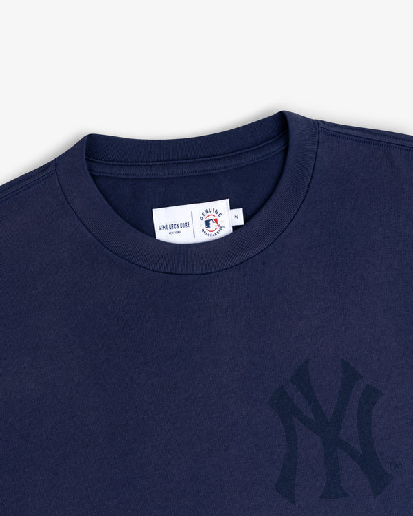 Navy Yankees Washed Logo Tee with team logo plus Aimé Leon Dore and Mitchell & Ness label.