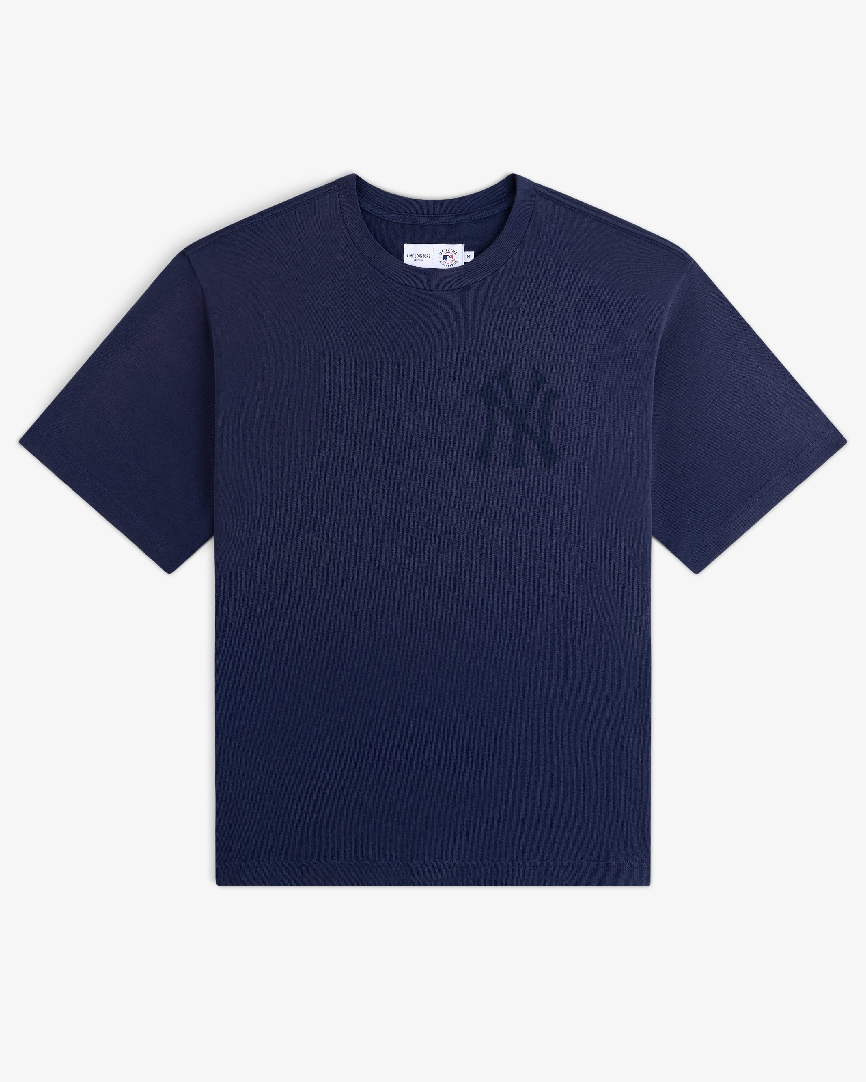 Yankees Washed Logo Tee: navy blue short-sleeve shirt with a dark NY Yankees logo on the left chest.
