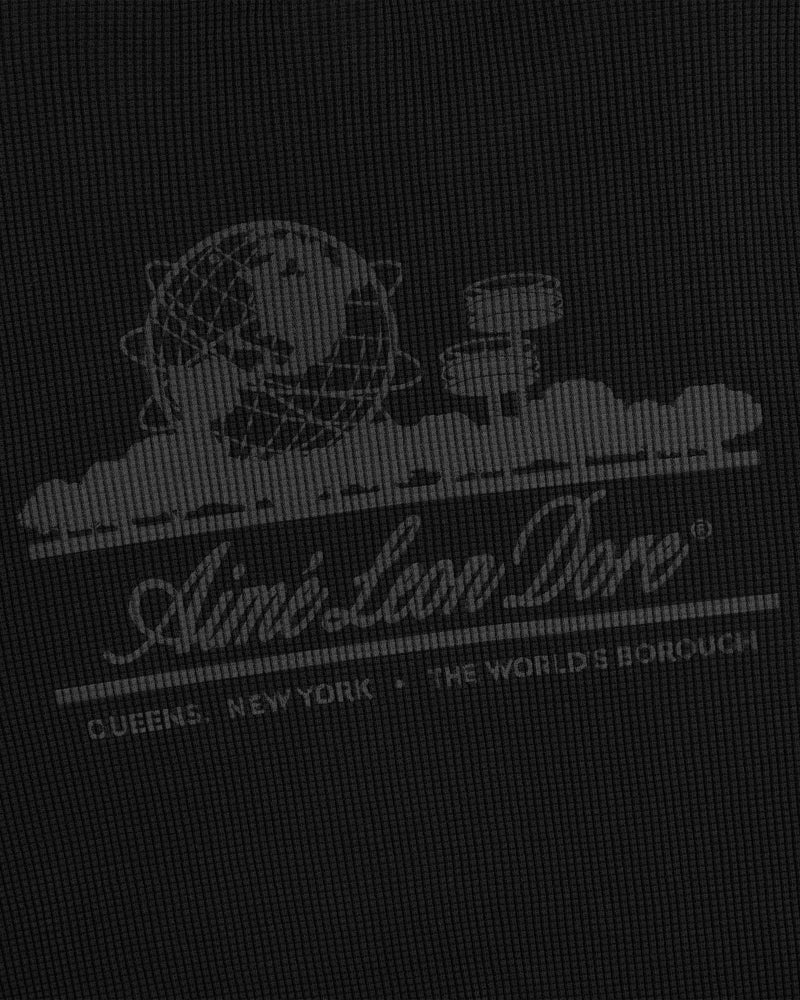 White globe and circular graphics with “Aimé Leon Dore® Queens, NY” on Long-Sleeve Unisphere Waffle Thermal.