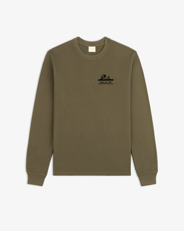 Olive Long-Sleeve Unisphere Waffle Thermal with small black graphic and text on the upper left chest.