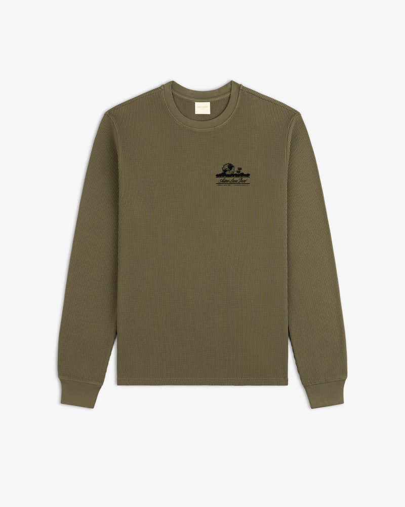 Olive Long-Sleeve Unisphere Waffle Thermal with small black graphic and text on the upper left chest.