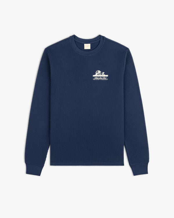Navy Long-Sleeve Unisphere Waffle Thermal with a white chest graphic and text.