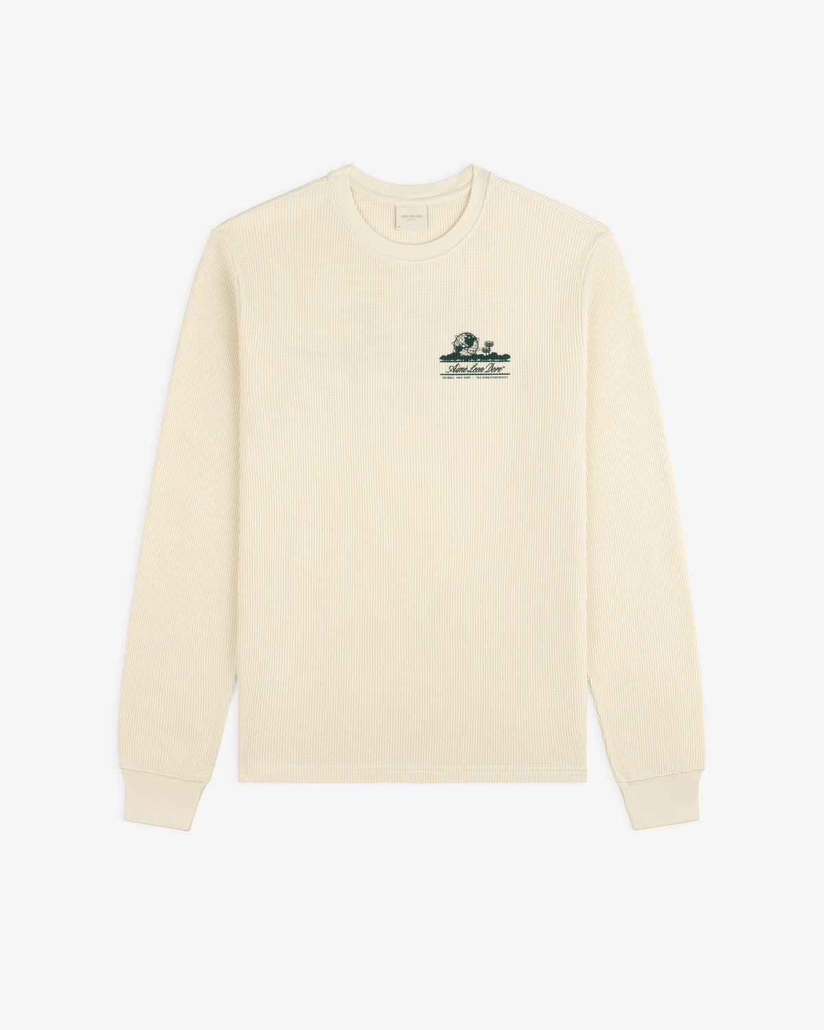 Cream Unisphere Waffle Thermal, long sleeves, ribbed texture, small green logo embroidered on left chest.
