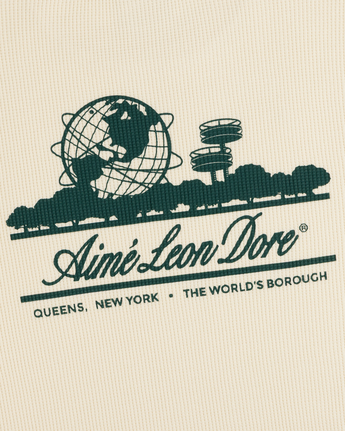 Green logo with globe, trees, towers, and Unisphere; Aimé Leon Dore Long-Sleeve Unisphere Waffle Thermal text.
