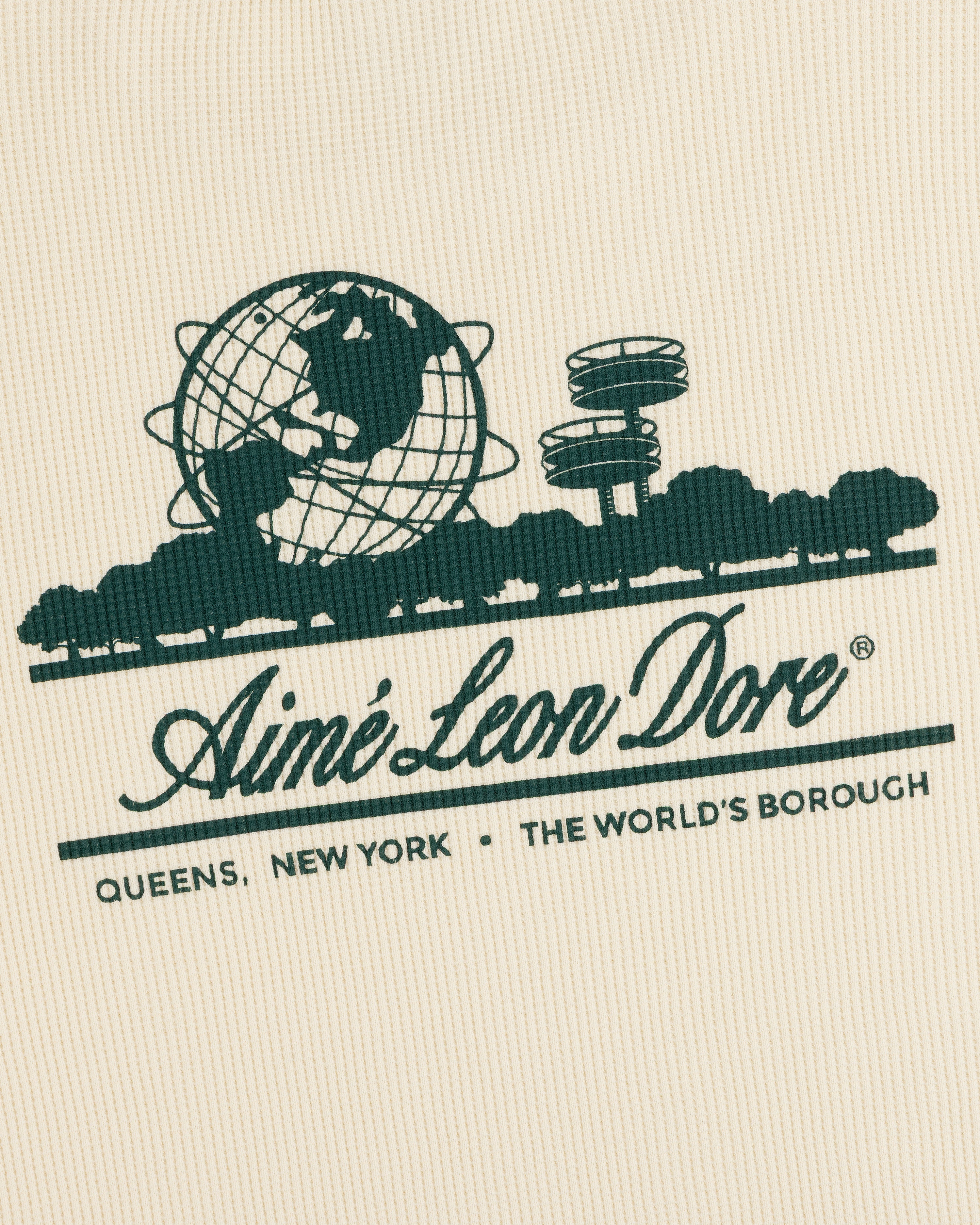 Green logo with globe, trees, towers, and Unisphere; Aimé Leon Dore Long-Sleeve Unisphere Waffle Thermal text.
