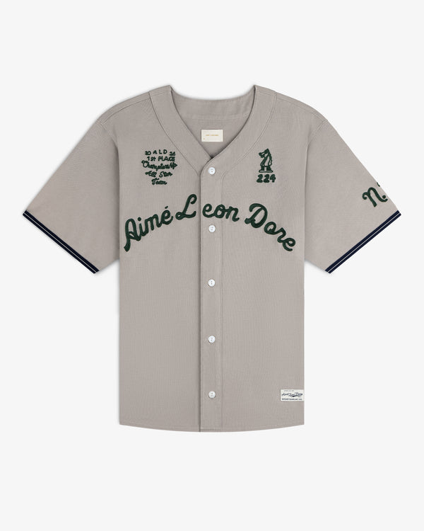 Mulberry Chainstitch Baseball Jersey with Aimé Leon Dore script, front buttons, and patches, in gray.