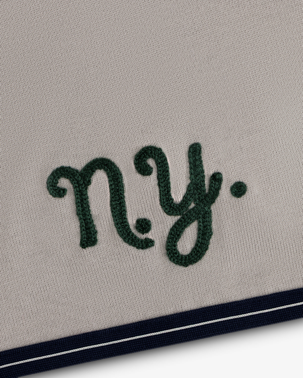 Mulberry Chainstitch Baseball Jersey: Embroidered green NY on beige with navy/white striped bottom edge.