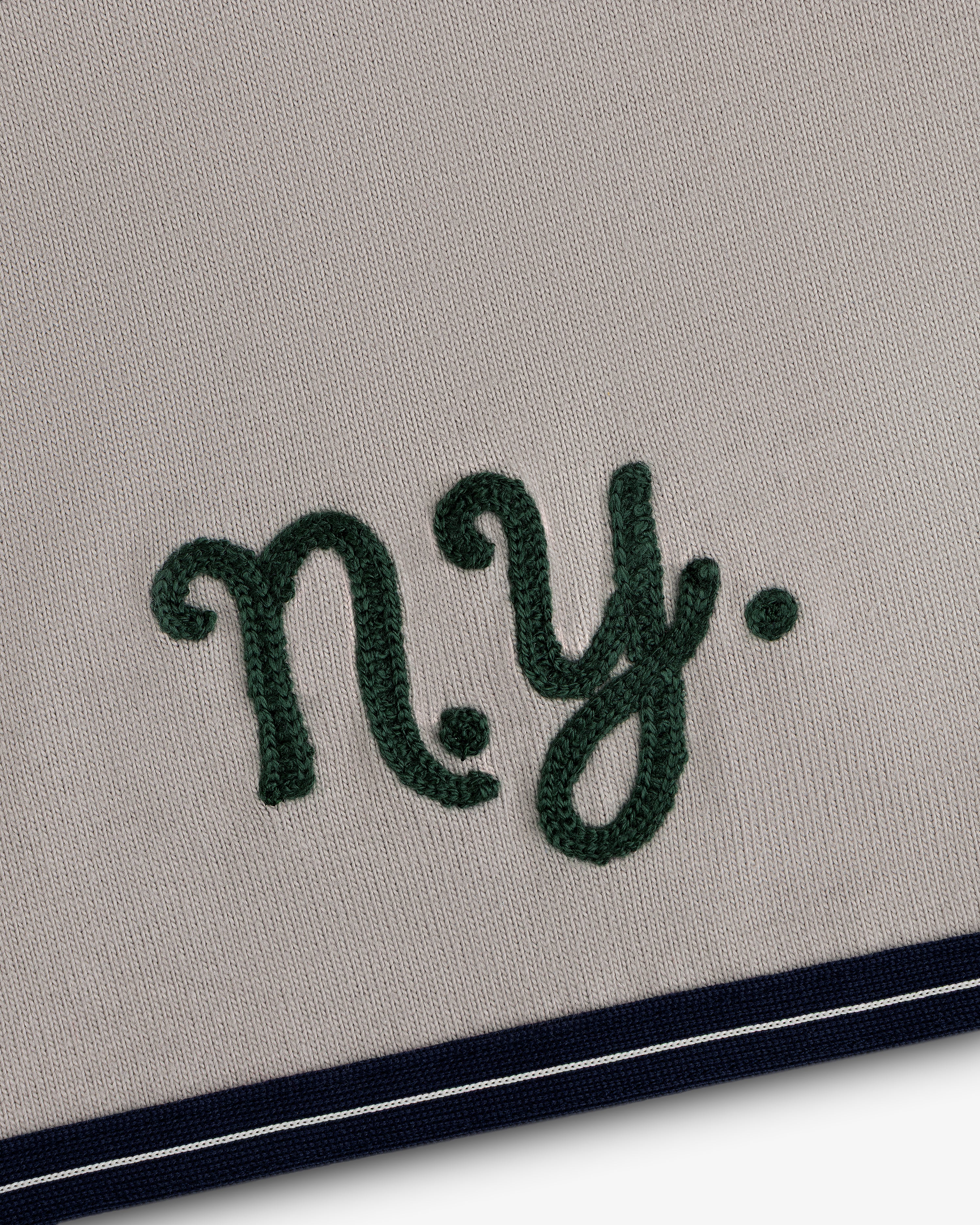 Mulberry Chainstitch Baseball Jersey: Embroidered green NY on beige with navy/white striped bottom edge.