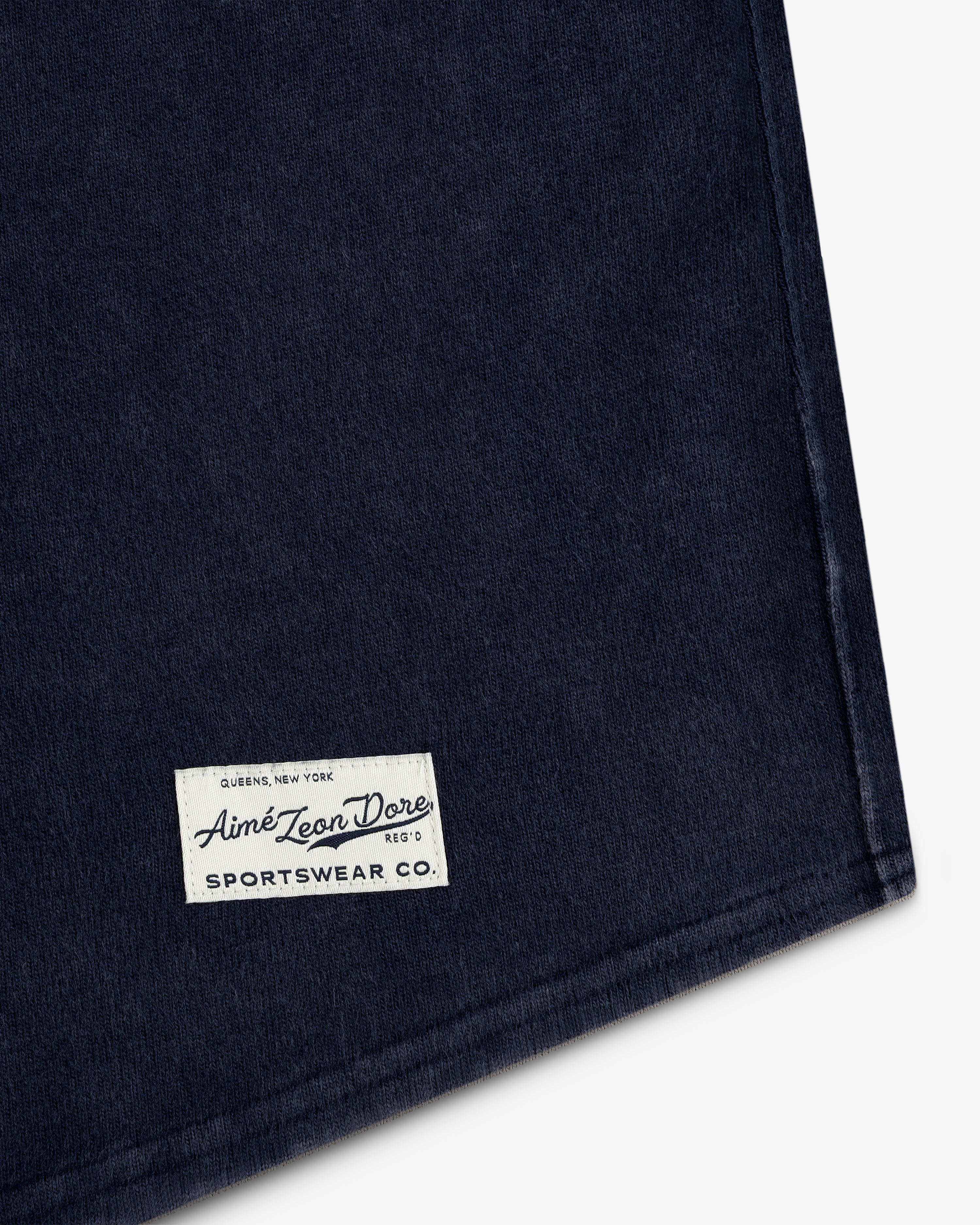 Navy Mulberry Chainstitch Baseball Jersey with white Aimé Leon Dore Sportswear Co. label on the bottom corner.