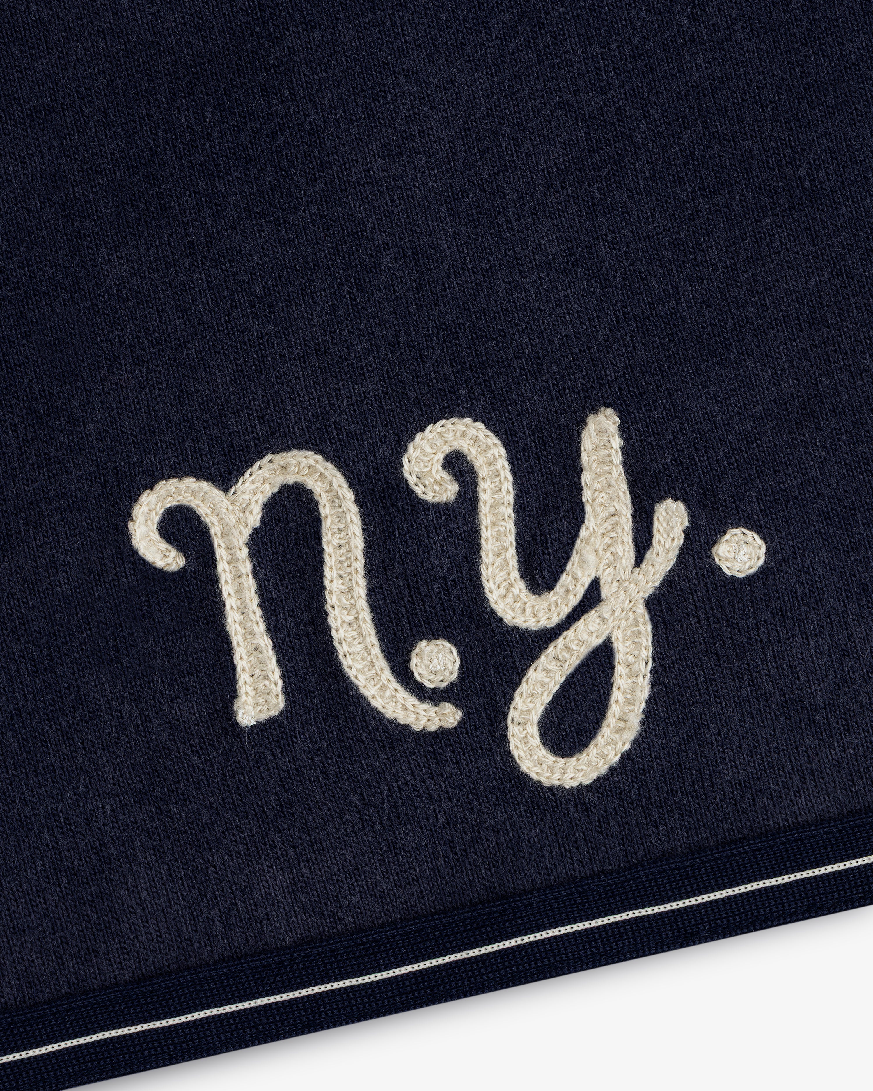 Navy Mulberry Chainstitch Baseball Jersey with “n.y.” white cursive near a white-striped edge.