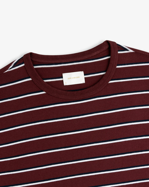 Yarn Dyed Striped Tee in burgundy with white and navy stripes, neck to upper chest view on white background.