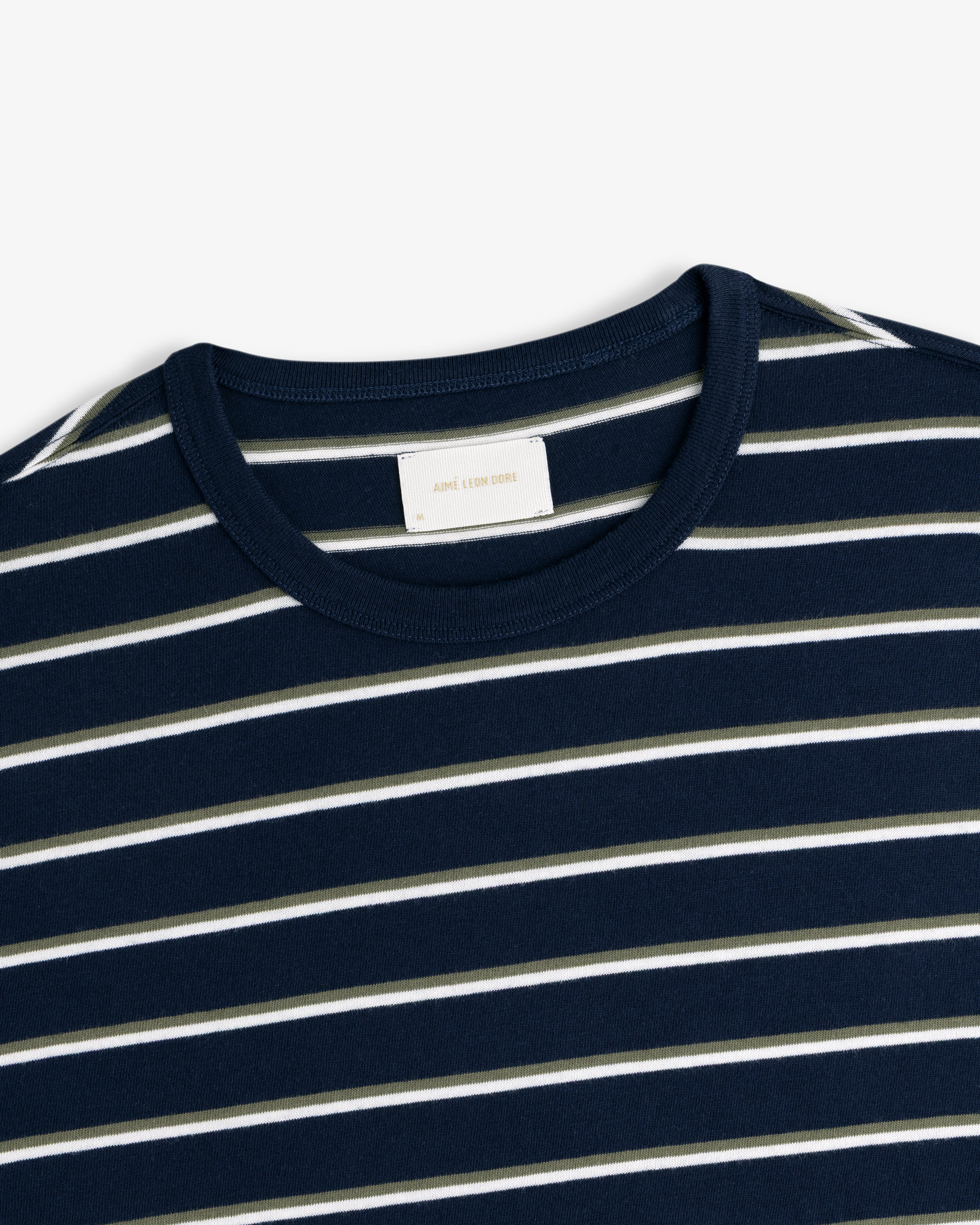 Yarn Dyed Striped Tee in navy with white and olive stripes, shown from the collar and upper chest.