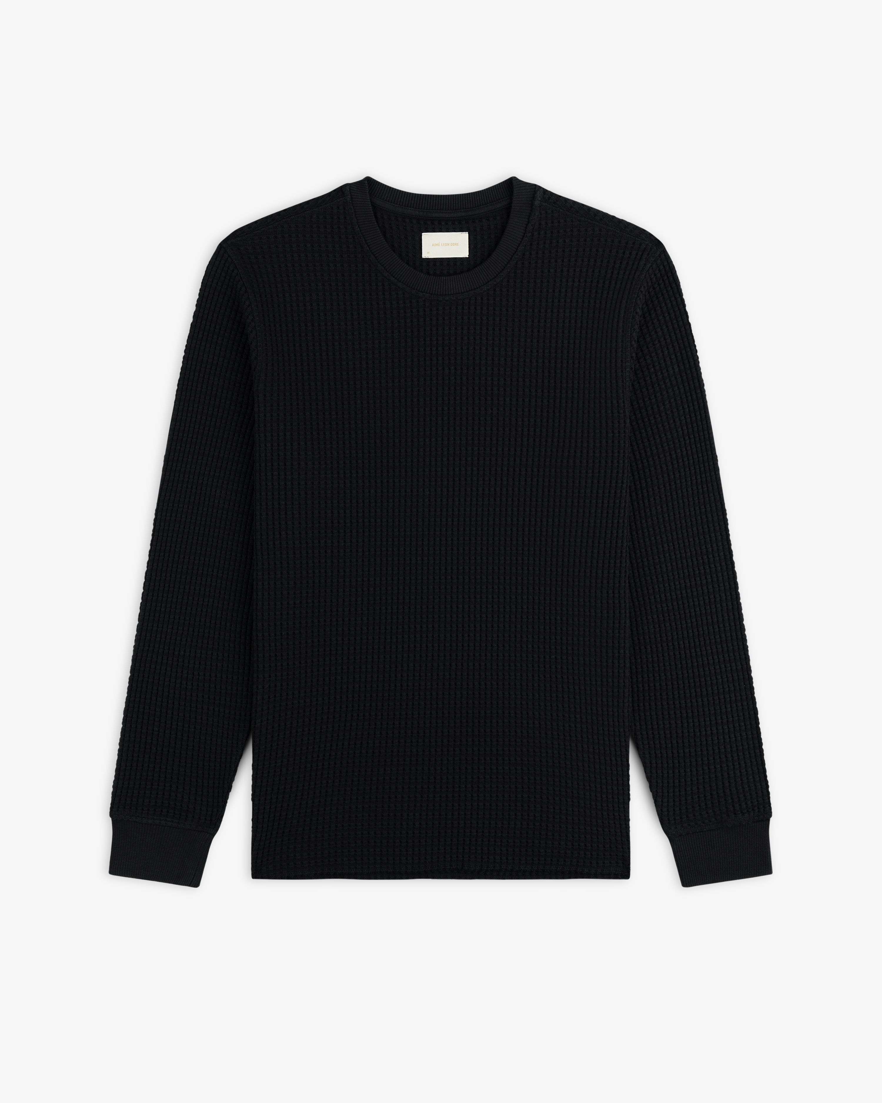 Black Long-Sleeve Waffle Thermal shirt in a waffle-knit texture.