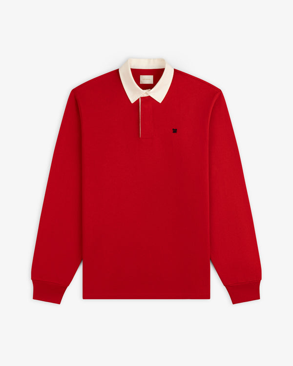Crest Rugby red long-sleeve polo with white collar and black chest logo, shown flat on a white background.